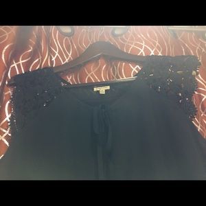 Black blouse with beautiful details in shoulders